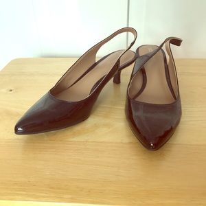 Black faux patent slingback kitten heels